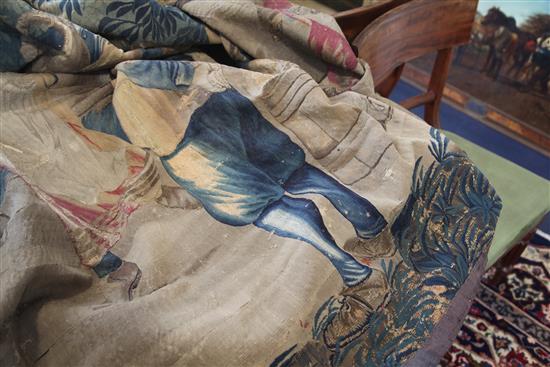 An early 18th century Flemish Teniers tapestry, from the workshop of Guillaume Werniers, H.8ft 10in. x W.13ft, extensive minor repair An early 18th century Flemish Teniers tapestry, from the workshop of Guillaume Werniers, H.8ft 10in. x W.13ft, extensive minor repair